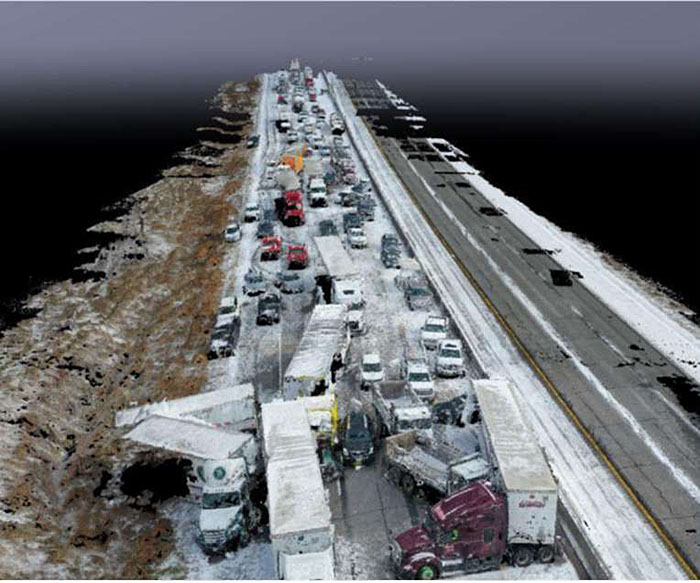 Photo of Unmanned Aerial System 3-D imaging used for crash investigation showing an overhead image of a large pileup accident of numerous semis, trucks and other vehicles on an icy freeway in Iowa.