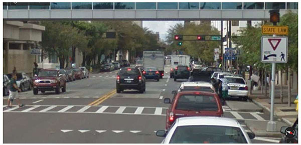 Authors relevant description: Example photo at bottom shows the midblock crosswalk location