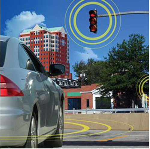 Title slide: This slide contains the title with a placeholder graphic of a vehicle wirelessly communicating with a traffic signal. There are three yellow rings around the traffic signal and three yellow rings around the vehicle, indicating wireless communication.