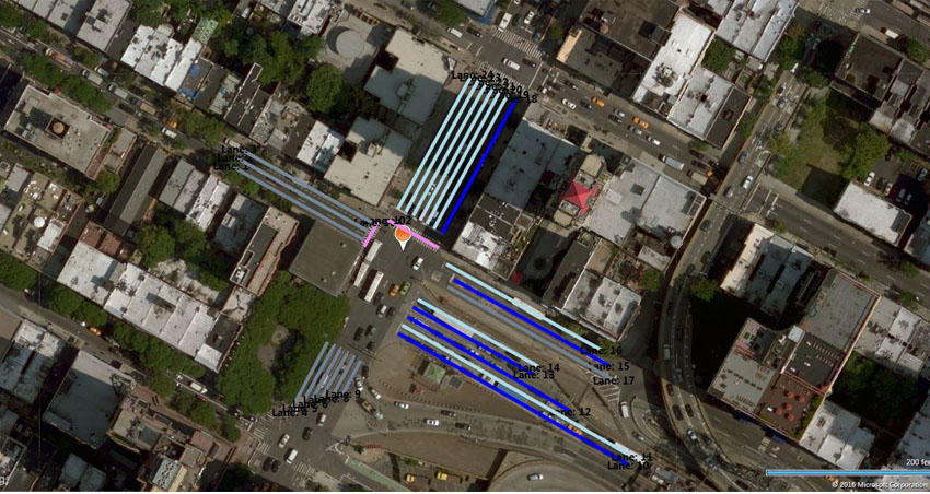 The slide entitled "What are the mandatory elements of a MAP message" has a graphic that shows an example aerial view of an intersection in New York City. There is a one-way main street going down with a total of seven lanes approaching the intersection. The rightmost lane approaching the intersection is represented by a dark blue line, meaning it is the original referenced lane using node offsets. The other six lanes on the approach are represented with a light blue line, indicating they are computed lanes based on the original reference lane. There are six lines on the main street leaving the intersection. Each of them has is indicated with a gray line. There are pink lines along the sides of the intersection representing pedestrian crosswalks. The side street has one three lanes leaving the intersection, each of them indicated with a gray line. The other side has eight lanes approaching the intersection. Going against the direction of the main street, the first lane is represented with a dark blue line, indicating node offsets. The second lane is represented by a light blue line and is a computed lane based on the first lane. The third is shorter than the first and is represented with a dark blue line. The fourth lane is shorter than the third and is represented with a dark blue line. The fifth lane is represented with a light blue line and is computed based on the fourth line. The sixth lane is leaving the intersection and is indicated with a gray lane. The seventh lane is approaching the intersection and is indicated with a dark blue line. The eighth lane is represented by a light blue line and was computed based on the seventh lane. In the center of the intersection is an orange bubble that represents the reference point. Each lane is labeled with its lane identifier.