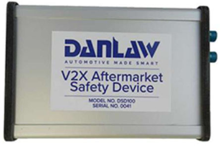 Photo of an actual unit from NYC CV Pilot project - labeled V2X Aftermarket Safety Device.