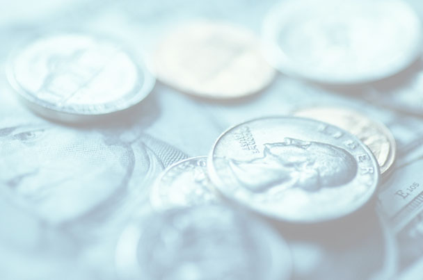 Background image - a faded photo of scattered US coins and dollar bills.