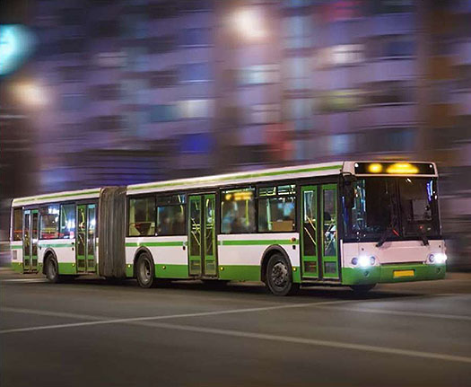 Photo of a transit bus moving to the right.
