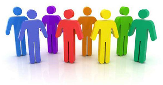 This slide has a graphic in the lower right corner of eight human figures standing side by side, each in a different color of the rainbow that appears when the Staff Groups bullet appears.