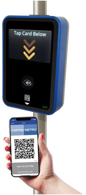 The figure shows a reader / validator device and a hand holding a mobile phone with the Capitol Metro QR product under the device.