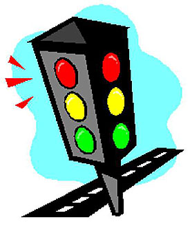 This slide has a graphical illustration showing a traffic signal on the street network. The red signal indication on the traffic signal is on.