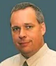 Headshot of Ed Cox