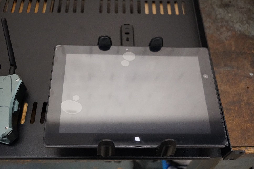 This photo shows the tablet mounted on a component shelf.