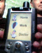 a close up view of a Personal Digital Assistant, on which the screen reads Home, Work, Doctor