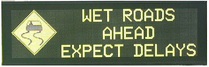 Authors relevant description: Example: A DMS is shown at right side with a message. WET ROADS AHEAD EXPECT DELAYS.